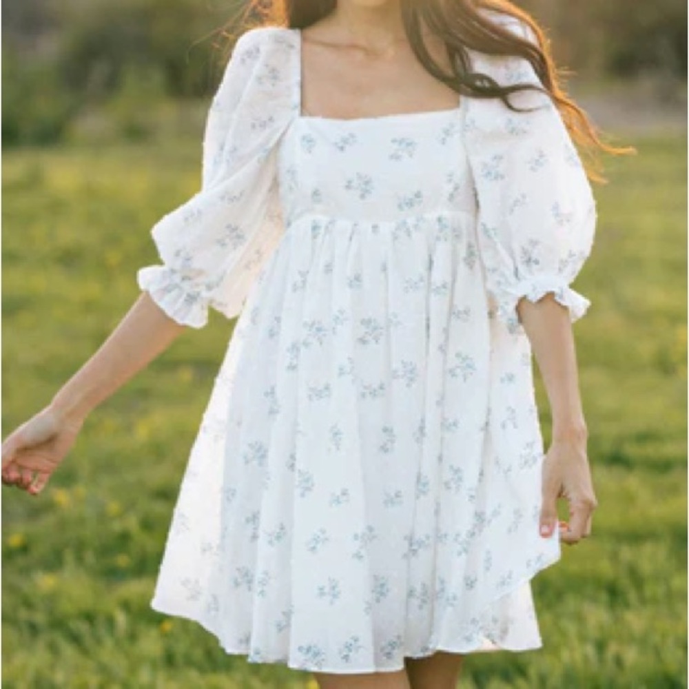 White puff sleeve babydoll dress with delicate blue flowers